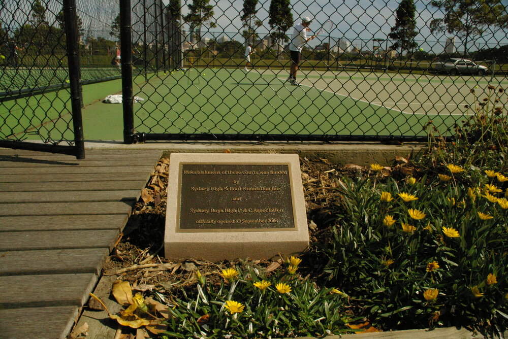Plaque for tennis court refurbishment