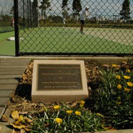 Plaque for tennis court refurbishment